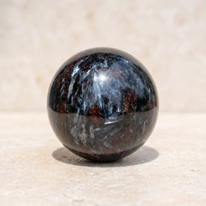 Small Arfvedsonite Sphere 1.5 Inch Natural Blue Flash Crystal Ball Pocket Palm Stone
