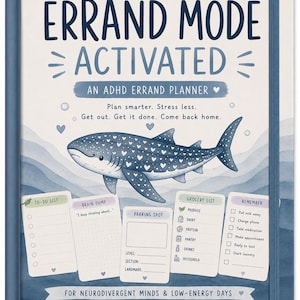 May include: A hardbound planner titled "Errand Mode Activated: An ADHD Errand Planner" with a blue whale shark illustration covered in white hearts. The cover features sections for a to-do list, brain dump, parking spot, grocery list, and reminders.