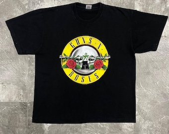 T-shirt XL Guns N' Roses, millésime 2004 | T-shirt à bande noire en coton épais Fruit of the Loom | Marchandise de musique rock de l'an 2000 | Logo représentant une balle classique