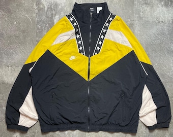 Vintage Nike Premium Windbreaker Jacke Größe XL | 90er Jahre Nike Colorblock Trainingsjacke Gelb Schwarz Weiß | Streetwear Star Pattern leichte Jacke