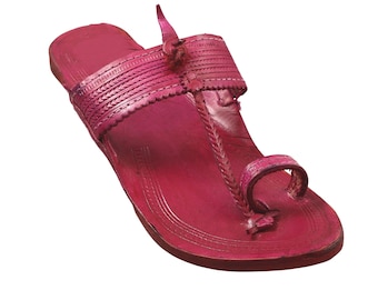 May include: A single, vibrant magenta leather sandal. The sandal features a toe loop and a strap across the top of the foot, with braided and stitched detailing. The sole is a darker shade of magenta.