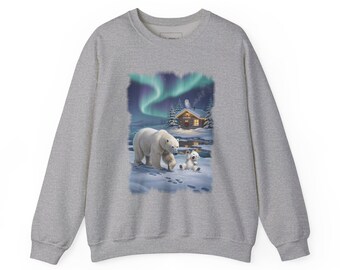 May include: A heather grey crewneck sweatshirt featuring a graphic print of a large polar bear and a cub in a snowy landscape. The scene includes a small cabin with glowing windows, evergreen trees, and a vibrant green aurora borealis in the sky.