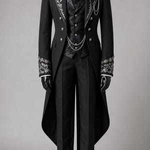 Step into dark Victorian elegance with this black gothic tailcoat ensemble crafted from premium cotton. Featuring subtle embroidery and a dramatic long coat silhouette, this aristocratic formal outfit is ideal for gothic ceremonies, vampire themed events, steampunk fashion lovers, and alternative wedding attire. A timeless dark fashion piece designed for those who appreciate refined gothic style and classic Victorian tailoring.