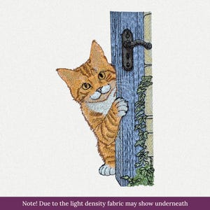 May include: An embroidered design of an orange tabby cat with white chest and paws peeking from behind a blue wooden door frame. The door features a dark metal handle and green ivy vines climbing up the side. The text reads: Note! Due to the light density fabric may show underneath.