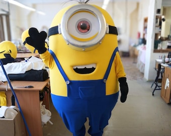Enögd gul tecknad monstermaskotdräkt rolig karaktärsdräkt för evenemang, fester, kampanjer, skolshower, cosplay-dräkt
