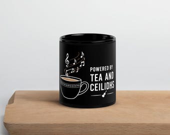 Powered by TEA and CEILIDHS - Black Glossy Mug