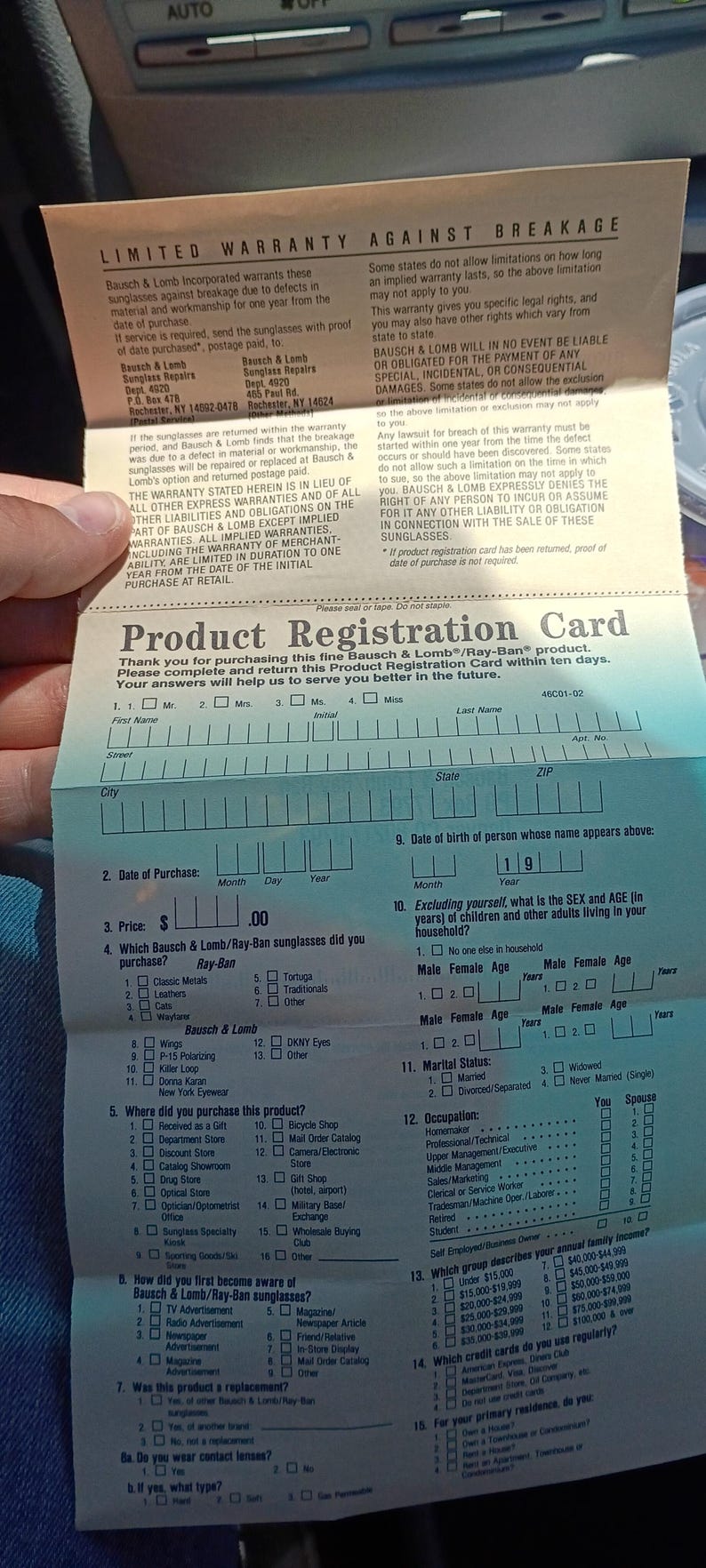 May include: A product registration card for Bausch & Lomb Ray-Ban sunglasses. The card includes sections for personal information, purchase details, and questions about the product and the buyer's preferences.