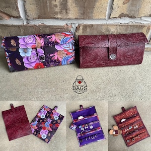 May include: Two jewellery organisers. One is a rectangular, floral-patterned clutch with a snap closure. The other is a burgundy leather roll-up case with a floral embossed design and a snap closure. The bottom row shows the organisers open.