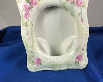 Pink baby Roses hand painted on a porcelain picture frame