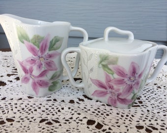 Creamer and Sugar bowl hand painted porcelain with Clematis flowers