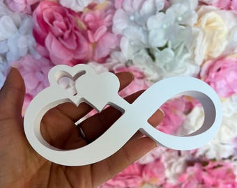 Símbolo do infinito com coração