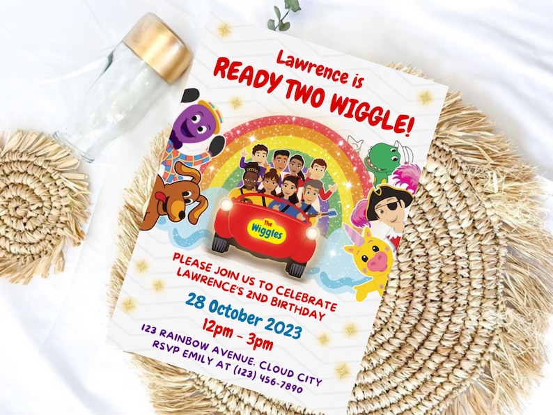 May include: A rectangular birthday invitation card featuring The Wiggles characters in a red car under a rainbow. Text reads: Lawrence is READY TWO WIGGLE! PLEASE JOIN US TO CELEBRATE LAWRENCE'S 2ND BIRTHDAY 28 October 2023 12pm - 3pm 123 RAINBOW AVENUE. CLOUD CITY RSVP EMILY AT (123) 456-7890.