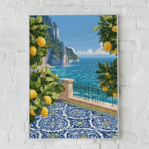 May include: A rectangular wall art print featuring a coastal scene with a blue sea, rocky cliffs, and a terrace with a blue and white patterned tile floor. Lemon trees with bright yellow lemons frame the view, and a metal railing borders the terrace.