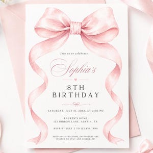 May include: A white birthday invitation card featuring a large watercolor pink bow at the top with long flowing ribbons. The text reads: Join us to celebrate Sophia's 8TH BIRTHDAY, SATURDAY, JULY 16, 20XX AT 2:00 PM, LAUREN'S HOME, 123 RIBBON LANE, AUSTIN, TX, RSVP BY JULY 2 TO 123.456.7890, DROP-OFF IS WELCOME, OR PARENTS ARE INVITED TO STAY AND CELEBRATE!