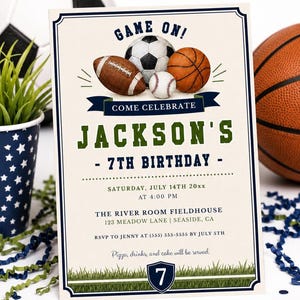 May include: A rectangular birthday invitation card featuring illustrations of a football, soccer ball, baseball, and basketball. The text reads GAME ON! COME CELEBRATE JACKSON'S 7TH BIRTHDAY, with event details, a grass border, and a shield with the number 7.