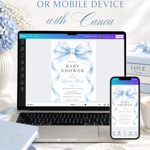 May include: A digital baby shower invitation template displayed on a laptop screen and a smartphone, featuring a large light blue watercolor bow at the top and elegant black text. The text reads EDIT ON A COMPUTER OR MOBILE DEVICE with Canva.