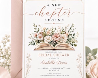 May include: A white rectangular bridal shower invitation card with a dusty rose envelope. The card features the text A NEW CHAPTER BEGINS above an illustration of an open book topped with pink and white flowers. Details include Isabelle Davis.