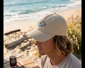 The Inland — Static Swell Eye Logo Dad Hat | Embroidered Unstructured Cap | Coastal Lifestyle Hat | Beach Hat for Men and Women
