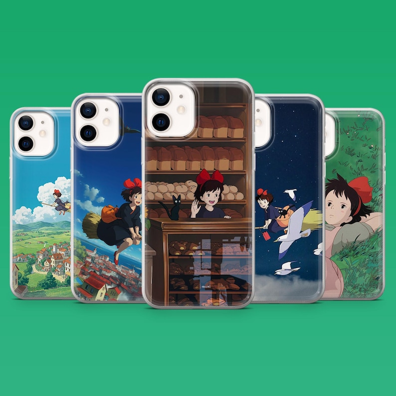 May include: Five phone cases with different designs featuring anime-style illustrations. The cases showcase scenes with a young girl with a red bow, a black cat, and various backgrounds, including a bakery, a starry night, and a coastal town.