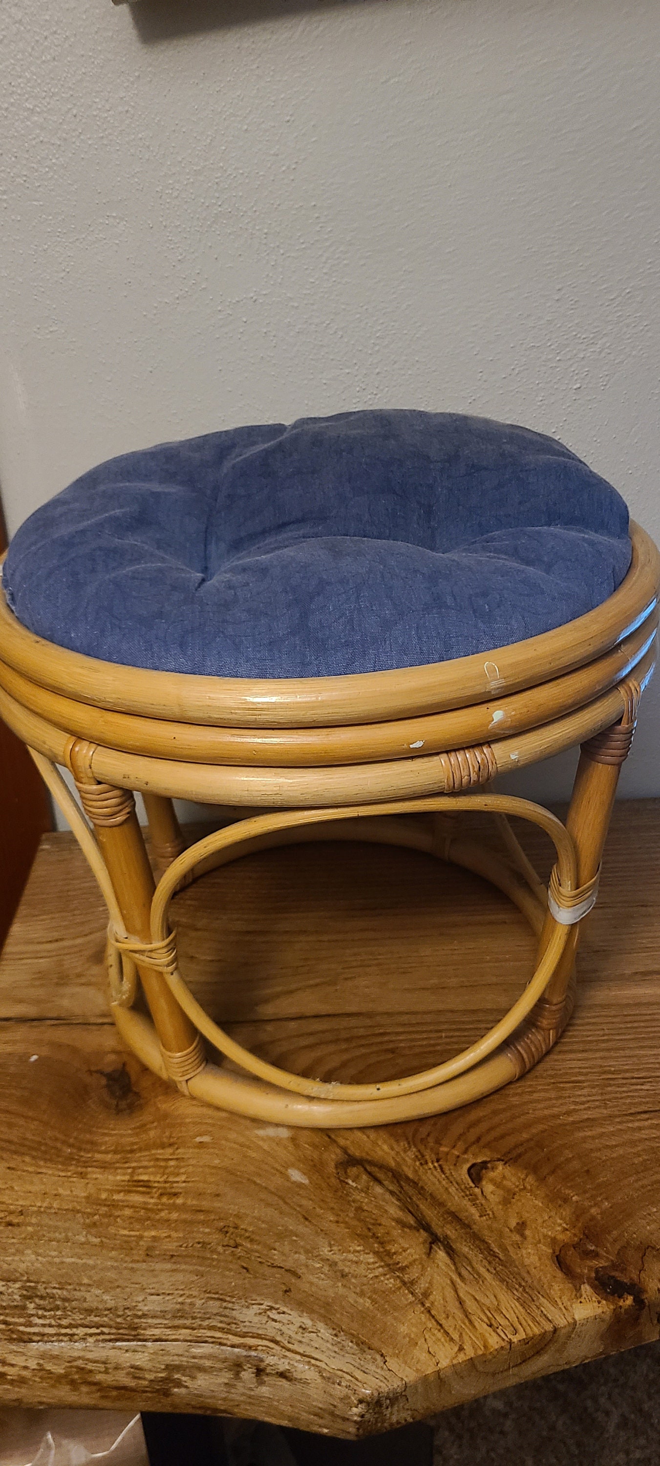 Vintage Round Rattan Foot Stool With Black Cushion