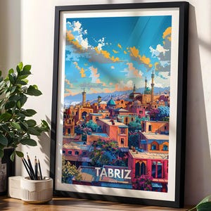 May include: A framed art print featuring a colorful illustration of Tabriz, Iran. The artwork depicts a cityscape with buildings in shades of orange, red, and blue under a vibrant sky. The word "TABRIZ" is displayed at the bottom.