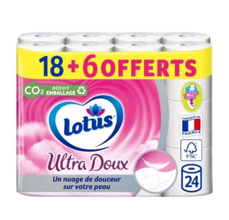 以下が含まれることがあります： Lotus Ultra Doux トイレットペーパーロールのパッケージ。パッケージは白、ピンク、黄色で、「18 + 6 OFFERTS」と「Ultra Doux」の文字が入っています。パッケージには「Un nuage de douceur sur votre peau」の文字も表示されています。