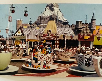 Vintage Disneyland Postcard – Circa 1950s /1960s - mad tea party. 1954 Abraham Lincoln 4 cent stamp. Posted March 28, 1963. Good condition.