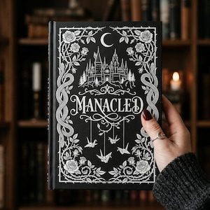 Manacled Deluxe – ilustrowana edycja w twardej oprawie z nadrukami artystycznymi i zakładkami
