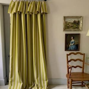Handmade olive green striped blackout curtains made from cotton linen blend with soft cotton lining. Features vertical woven stripes, farmhouse and cottagecore style design, offering privacy, thermal insulation, and room darkening. Ideal for bedroom, living room, nursery, and rustic home decor.