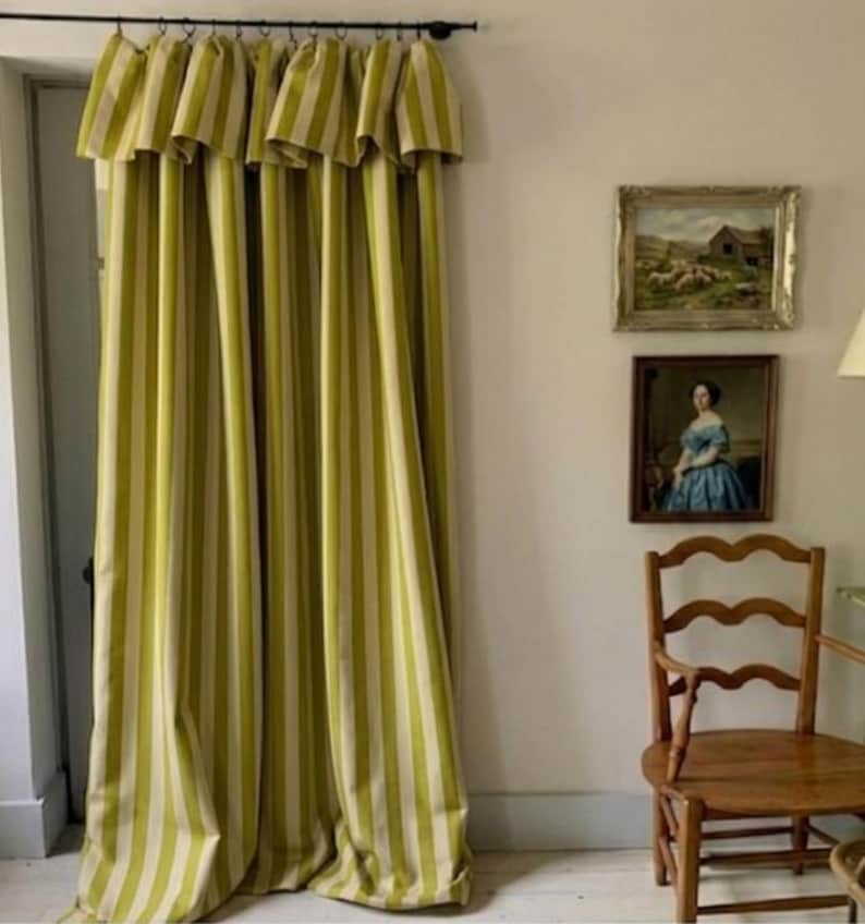 Handmade olive green striped blackout curtains made from cotton linen blend with soft cotton lining. Features vertical woven stripes, farmhouse and cottagecore style design, offering privacy, thermal insulation, and room darkening. Ideal for bedroom, living room, nursery, and rustic home decor.