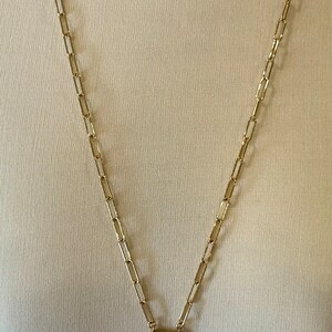 Paperclip Chain with labradorite complements many colors and is 28 inches long.  It is gold plated.