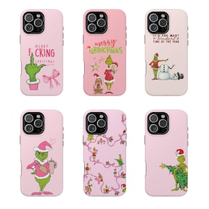 May include: Six light pink smartphone cases featuring various Grinch-themed illustrations. Designs include the Grinch with text, a snowman, a Christmas tree, and holiday lights. Each case has a camera cutout and a distinct festive graphic.