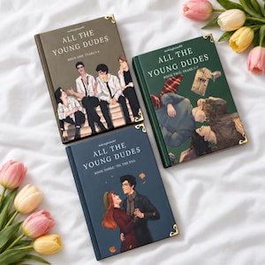 May include: Three hardcover books titled All The Young Dudes with gold corner accents. The first is brown with four characters, the second is green with two characters and a lighter, and the third is blue with a couple dancing together.
