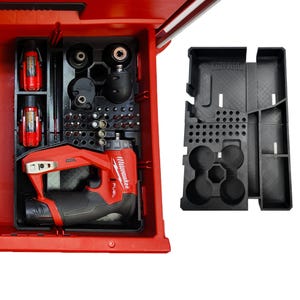 May include: A black plastic tool organizer insert with custom-molded compartments for a red Milwaukee Fuel power tool, two batteries, and various drill bits. The organizer is shown both inside a red tool case and as a standalone unit.
