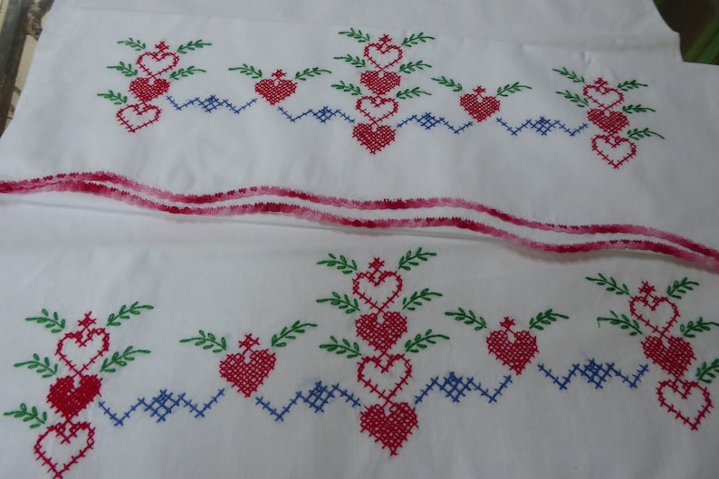 Vtg Hand Embroidered Pr White Cotton Pillowcases wCrochet Edge Red Hearts Green Leaves Blue Cross Stitch Standard Sz