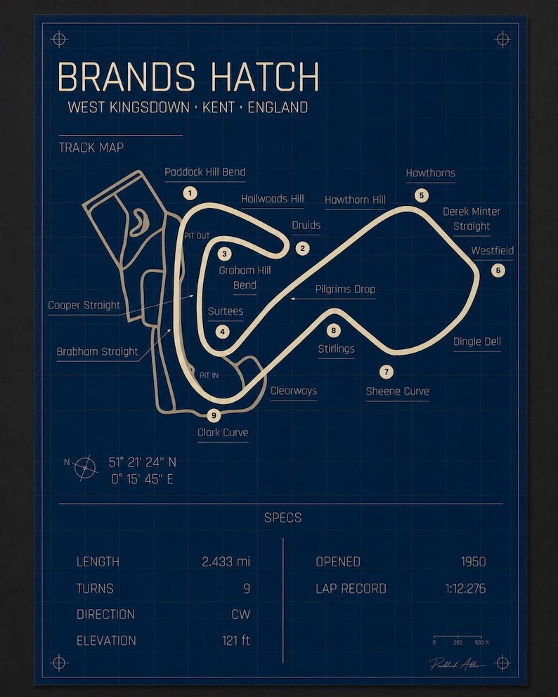 May include: A blueprint-style poster of the Brands Hatch race track in West Kingsdown, Kent, England. The track map is in beige against a dark blue grid background. Includes track details, specs, and coordinates. The length is 2.433 miles.