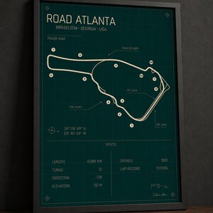 May include: Framed print of the Road Atlanta track map in Braselton, Georgia, USA. The map is in white on a dark teal background, with details including length (4.088 km), turns (12), and elevation (-32 m).