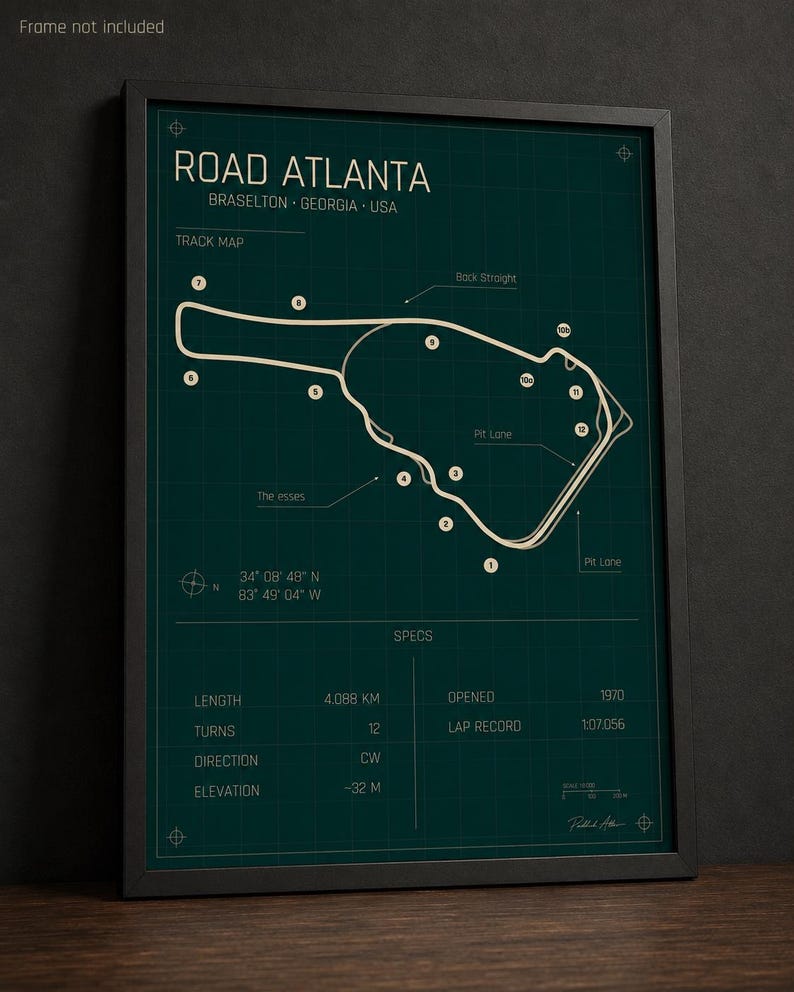 May include: Framed print of the Road Atlanta track map in Braselton, Georgia, USA. The map is in white on a dark teal background, with details including length (4.088 km), turns (12), and elevation (-32 m).