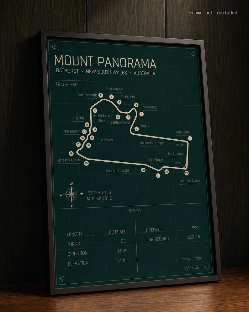 May include: A framed Mount Panorama track map, Bathurst, New South Wales, Australia. The dark green map features the track layout with labeled turns and key locations. Includes specs: 6.213 km length, 23 turns, and opened in 1938.