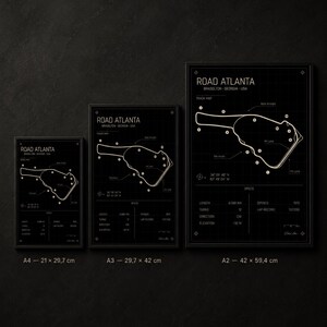 May include: Three framed black and white prints of the Road Atlanta race track map. The prints are labeled A4 (8.3 x 11.7 inches), A3 (11.7 x 16.5 inches), and A2 (16.5 x 23.4 inches). Each print includes track details.