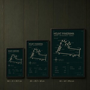 May include: Three framed prints of the Mount Panorama race track in Bathurst, New South Wales, Australia. The prints are in black frames and feature a dark green background with white text and track outlines. Sizes are A4 (8.3 x 11.7 inches), A3 (11.7 x 16.5 inches), and A2 (16.5 x 23.4 inches).