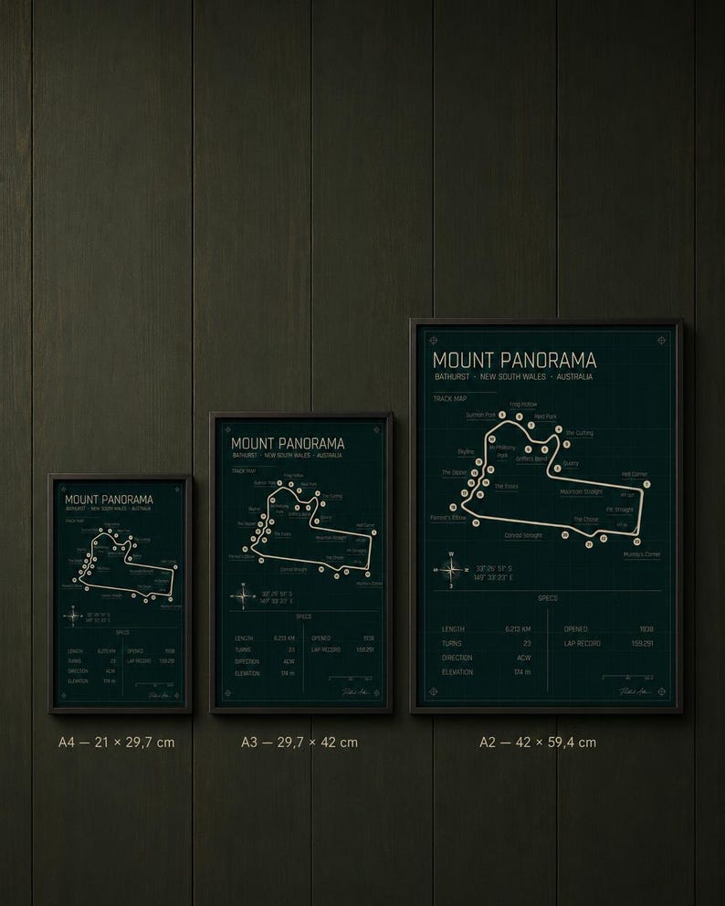 May include: Three framed prints of the Mount Panorama race track in Bathurst, New South Wales, Australia. The prints are in black frames and feature a dark green background with white text and track outlines. Sizes are A4 (8.3 x 11.7 inches), A3 (11.7 x 16.5 inches), and A2 (16.5 x 23.4 inches).