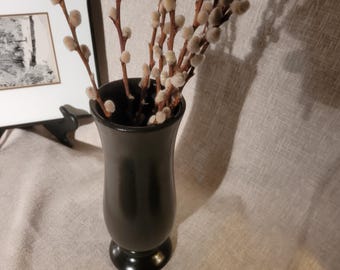 Modern Sleek Black Ceramic Pedestal Vase – Flared Trumpet Style. Satin glaze finish.