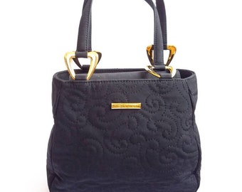 YSL vintage Yves Saint Laurent black handbag with golden details arabesque pattern