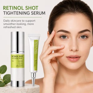 May include: A Retinol Shot Tightening Serum pump bottle and a matching tube with green and white labels. The text reads Retinol Shot Tightening Serum, Firms, Hydrates, Smooths, Texture. The packaging is white with silver accents and green panels.