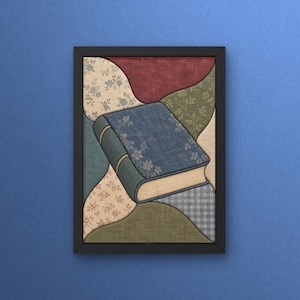 May include: A framed wall art piece featuring a central blue book with a floral pattern, surrounded by abstract, curved fabric patches in shades of red, green, beige, and blue. The background consists of various textures including floral prints and a blue checkered pattern.
