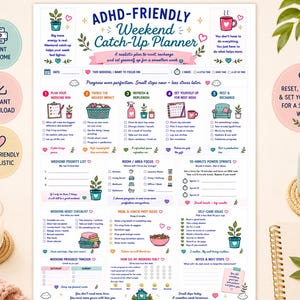 May include: A white paper planner titled ADHD-Friendly Weekend Catch-Up Planner with colorful icons and text sections for planning tasks, meal prep, self-care, and progress tracking. The layout includes checkboxes, lists, and prompts for weekend organization.