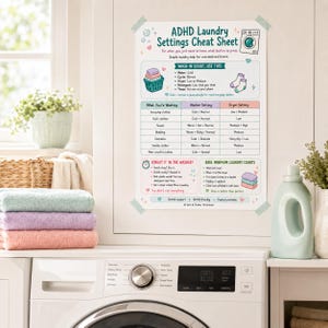 May include: A white paper sign titled ADHD Laundry Settings Cheat Sheet with colorful illustrations of a laundry basket, socks, and a washing machine. The chart provides instructions for washer and dryer settings, laundry tips, and care advice.
