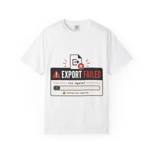 Può includere: T-shirt bianca con grafica "EXPORT FAILED" in nero e rosso, simile a un messaggio di errore del computer. La grafica include una barra di avanzamento allo 0% e la scritta "Nothing was exported".