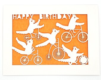 Happy Birthday Pandemonium of Parrots on Bike, group of parrots riding around on Bikes to say Happy Birthday, laser cut greeting card